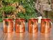 Set of Four Plain Copper Mugs